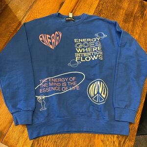 Vibrant Blue Crewneck Sweater with Graphic Design